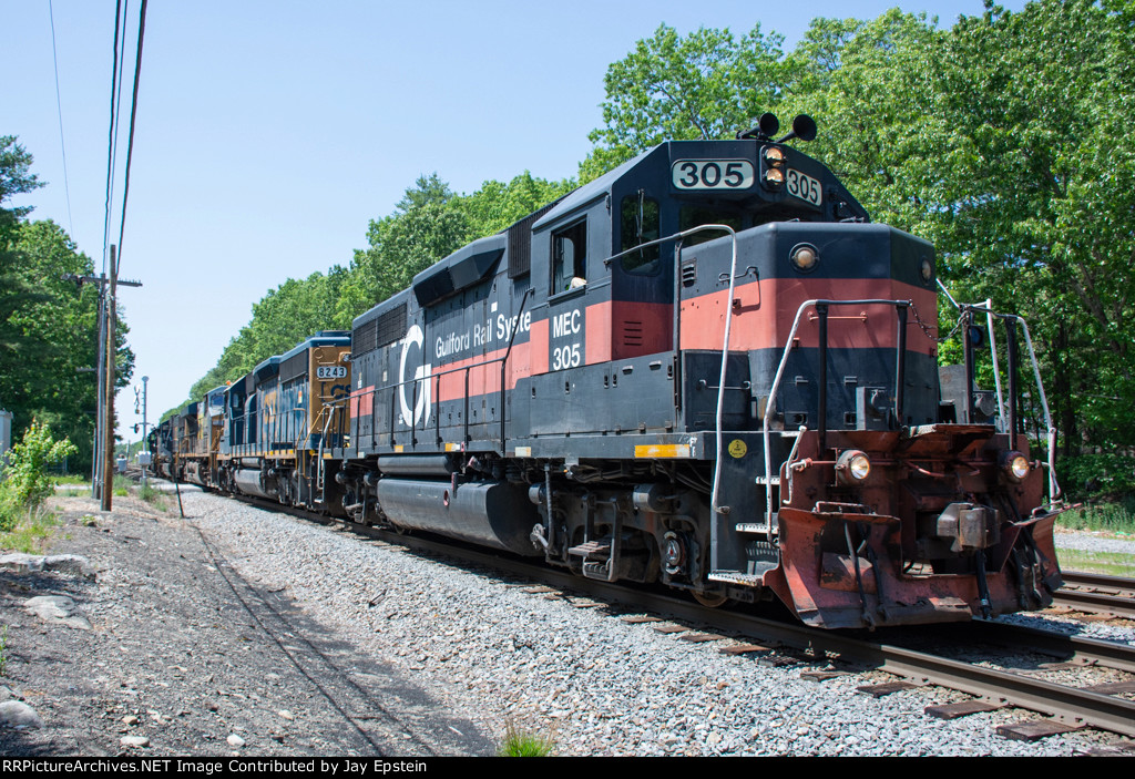 MEC 305 leads M427's pawer back to its train 